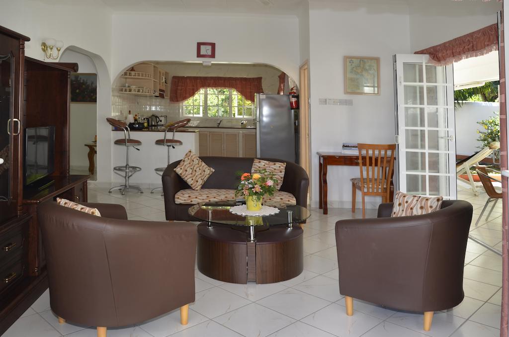 Ixora Villa Anse Royale Rum bild
