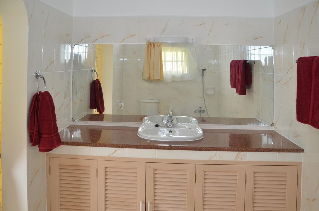 Ixora Villa Anse Royale Rum bild