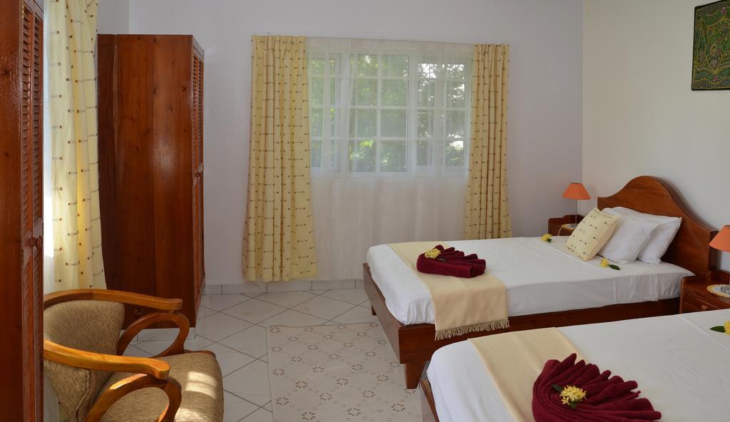Ixora Villa Anse Royale Rum bild