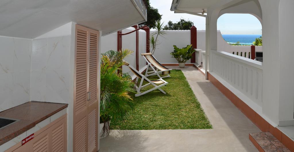 Ixora Villa Anse Royale Rum bild